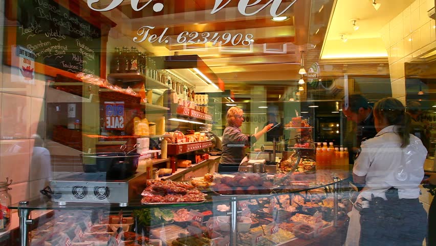 AMSTERDAM - CIRCA APR 2011: A delicatessen display window looks enticing circa April 2011 in Amsterdam.