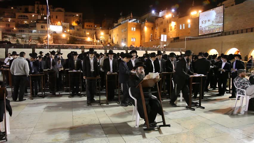 JERUSALEM, ISRAEL - OCT 6, 2011: Yeshiva students pray during Slihot at the Western Wall on October 6, 2011 in Jerusalem.