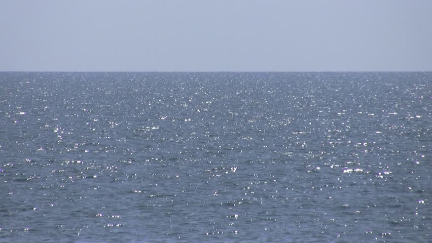 Motorboat sails on sea 