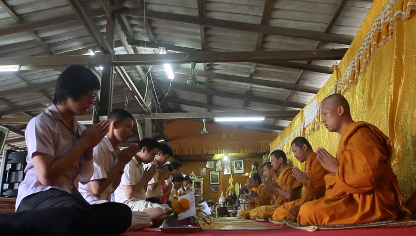 KO CHANG, TRAT/THAILAND - DECEMBER 5: Recitation of mantras by monks in a Buddhist monastery Wat Klong Prao on December 5, 2011 in Ko Chang, Thailand. On the occasion of the birth of King of Thailand.