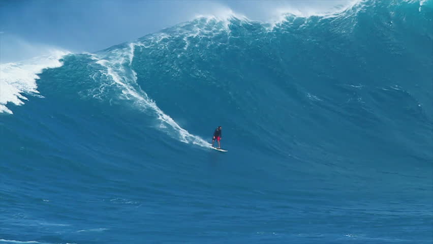 MAUI, HI - MARCH 13: Professional surfer Yuri Soledade rides a giant wave at the legendary big wave surf break known as "Jaws" during one the largest swells of the winter March 13, 2011 in Maui, HI.