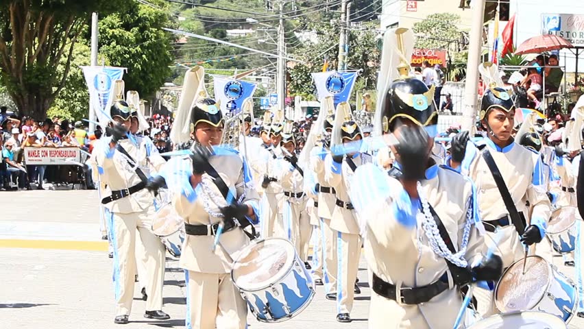 BANOS DE AGUA SANTA, ECUADOR - DECEMBER 16: Young students march in a parade for the anniversary of the cantonization of the city of Banos de Agua Santa, Ecuador on December 16, 2011.