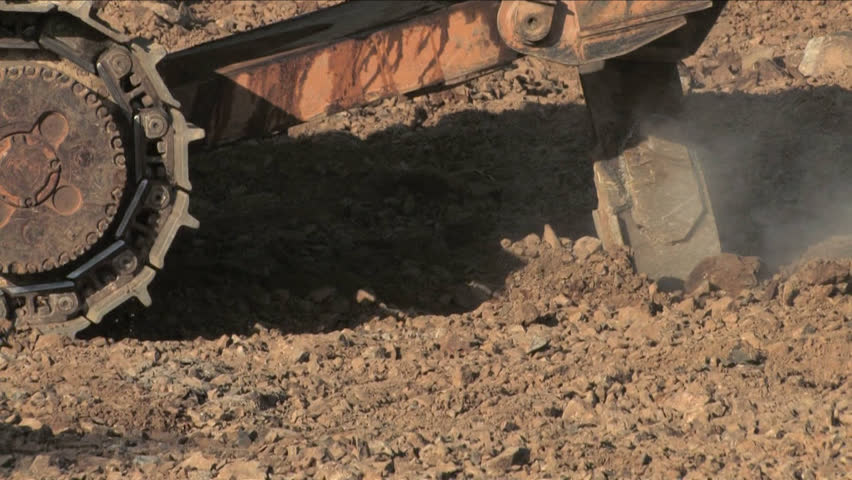 caterpillar tractor plowed soil
