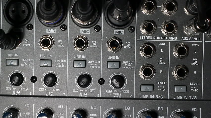 A extreme closeup view of a mixer input section.