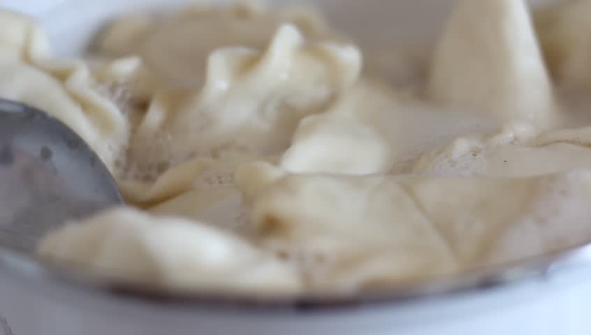 The national dish of Russia and Ukraine dumplings, cooked in a pan.