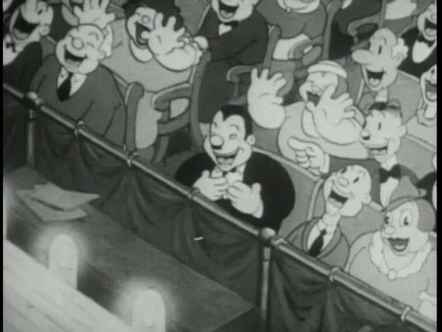 High angle view audience laughing at show