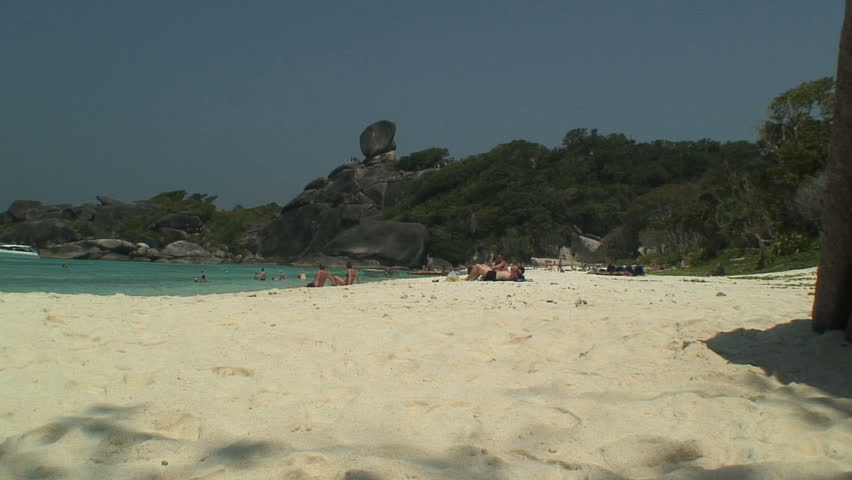 SIMILAN ISLANDS, THAILAND - FEBRUARY 3, 2007: Boulder Over Beach and Beachers