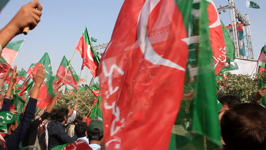 KARACHI, PAKISTAN - DECEMBER 25: Thousands of supporters attend a rally held by former cricketer turned politician Imran Khan's party Pakistan Tehreek-E-Insaf in Karachi, Pakistan on December 25, 2011.