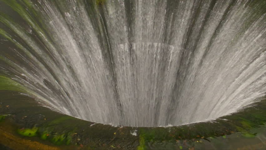 Overflow Water Funnel in Lake Dam