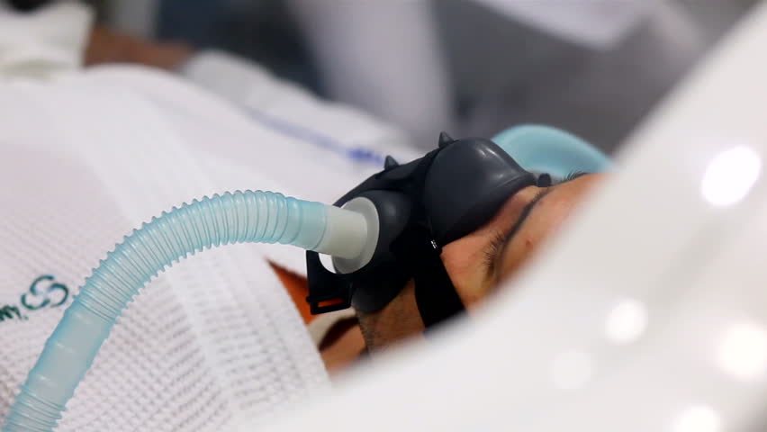 MONTENEGRO - PODGORICA 2011: Sportsman receiving treatment in hyperbaric chamber c. 2011 in Montenegro. Hyperbaric oxygen therapy allows patients to breathe 100% pure oxygen under increased pressure.