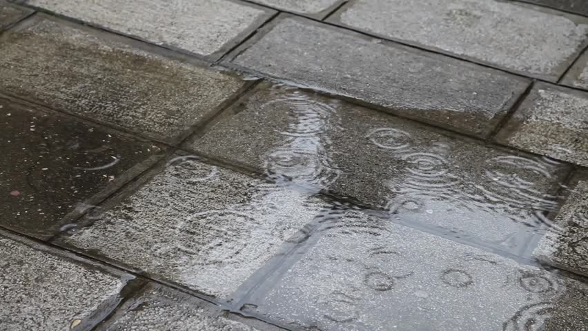 Rainy cobbled road