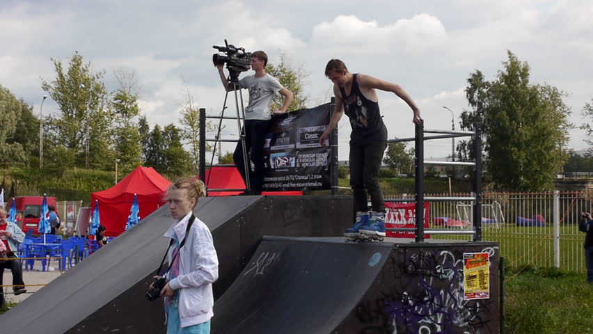 PETROZAVODSK, RUSSIA - AUGUST 27: Anonymous roller rider making tricks during Extreme side festival on August 27, 2011 in Petrozavodsk, Russia. Event was free for watching, shooting and participating