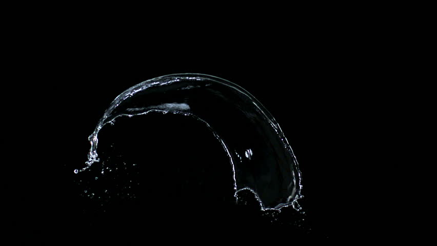 Slow-motion splash water against black drop shooting with high speed camera, phantom flex.