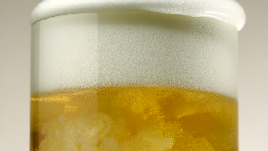 Extreme close-up beer foam and bubbles