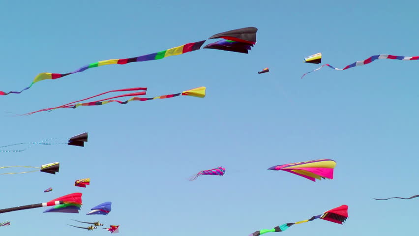 LONG BEACH, WA - AUGUST 16: Tourist enjoying kites from the boardwalk at the annual Washington State International Kite Festival on August 16, 2011.