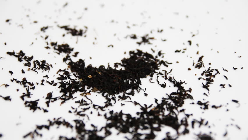 Tea crumbles to a white background