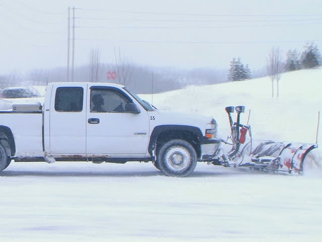Truck Plowing Snow 