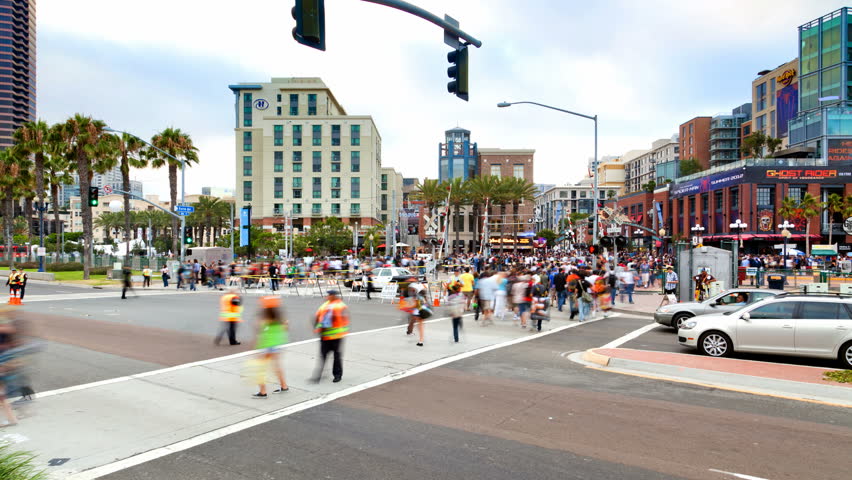 SAN DIEGO, CA - JULY 21: (Timelapse View) After a busy day, large crowds exit San Diego Comic-Con International on July 21, 2011.