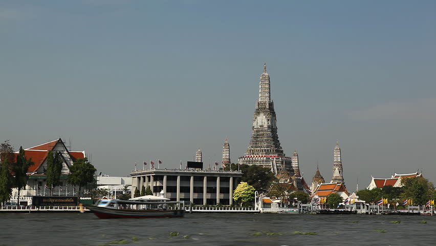 Time Lapse of Wat Arun, Buddhist Temple of the Dawn in Bangkok, Thailand, Chao Phraya River