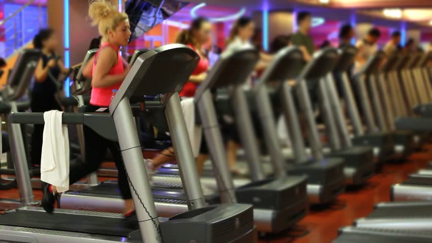 people doing sports in a gym