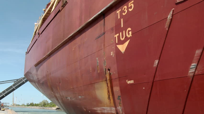 Lake Freighter or Cargo ship, moving slowly along the Welland Canal after just leaving Lock No. 1 on it's way towards Lake Erie.