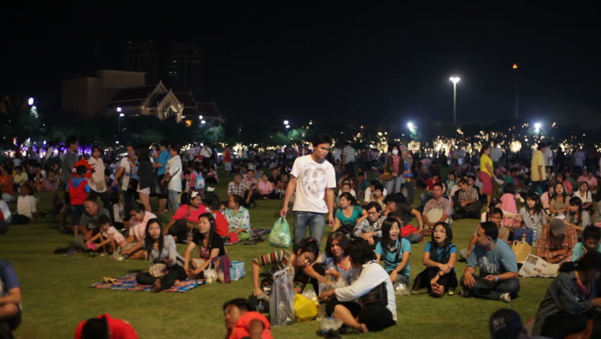 BANGKOK - DECEMBER 4, 2012: People are attending the King's birthday celebrations in Bangkok on December 4. 2012. It is one of the biggest celebrations in Thailand.