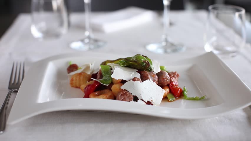 Gnocchi with sausage and vegetables. 360 rotation food