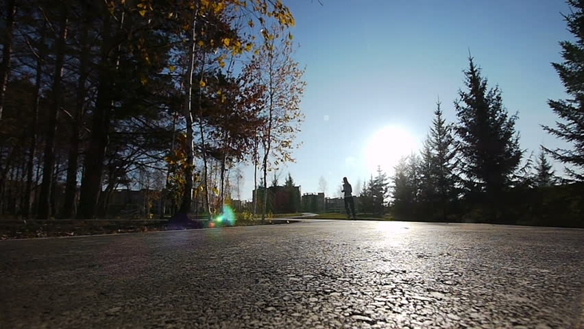 Girl runs through the park in the morning