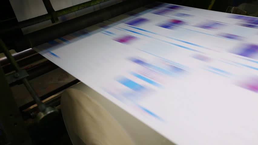 pan on print press typography machine in work