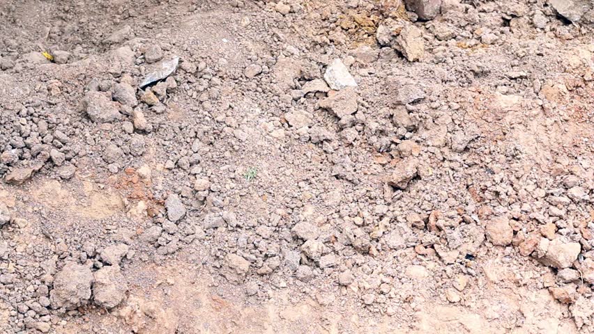 hd video of old computer monitor buried in a grave hole