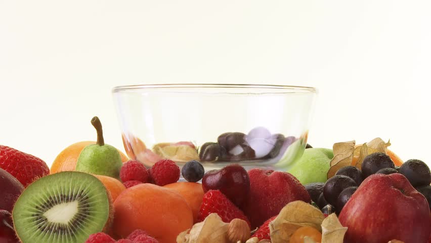 Fresh fruit and bowl of cornflakes