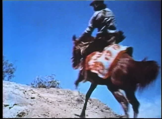 Wounded man tumbling off horse during ambush