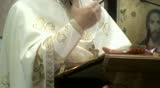 Priest in church during homily, Palermo, Sicily, Italy.