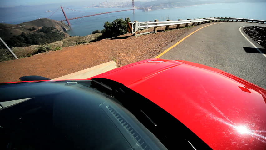 Californian road trip driving hillside on a winding road