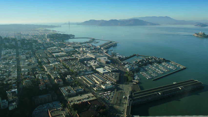 Aerial view over Fishermans Wharf with Alcatraz in the bay, San Francisco, California, North America, USA
