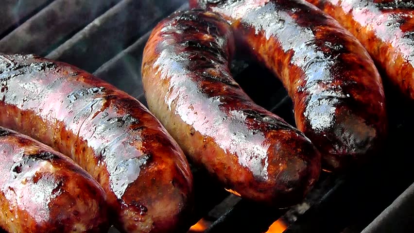  sausage on a hot barbecue grill. 