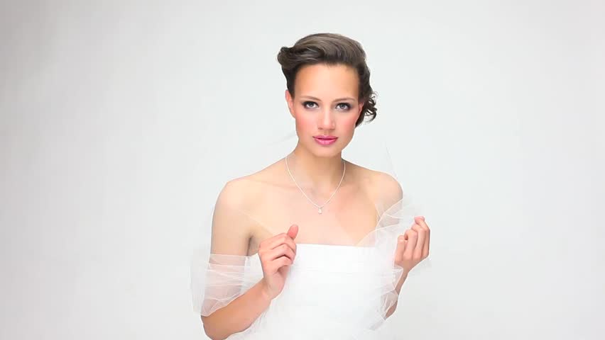 Gorgeous girl as bride smiling