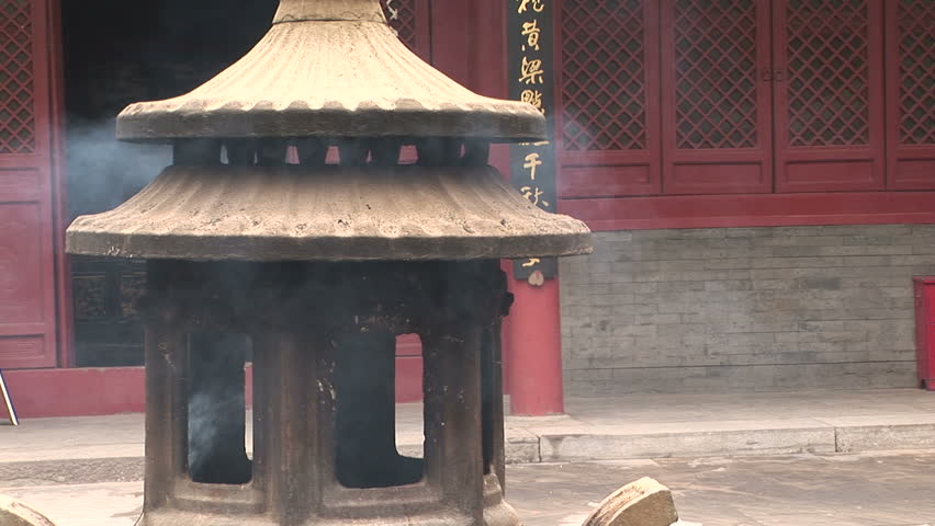 Incense burners smoking, White Cloud Temple, world's oldest Taoist temple, Beijing, China.