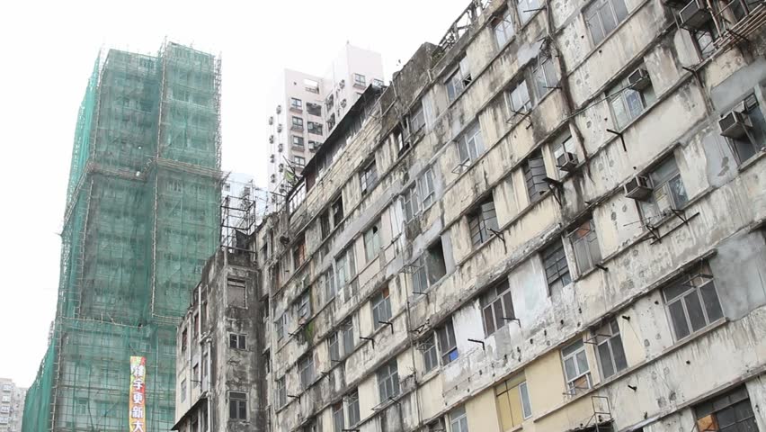 SHENZHEN, CHINA - CIRCA JUNE 2011: Impoverished chinese apartment building. 