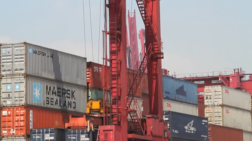 HONG KONG, CHINA - JUNE 8: Crane lifting Cargo Container at Kwai Chung Port. June 8, 2011 in Kwai Chung, Hong Kong, China