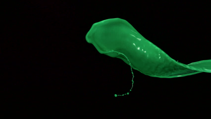 Green liquid splash in the air on black background shooting with high speed camera, phantom flex.