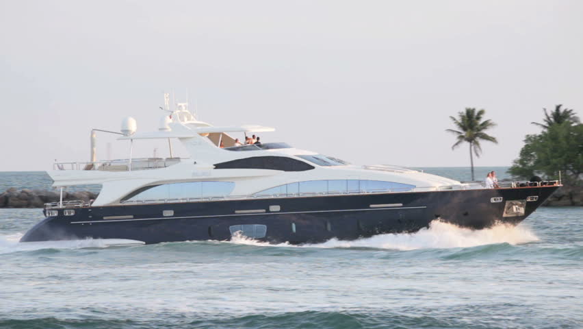 MIAMI - APRIL 12: Luxury yacht passing through Government Cut Inlet in Miami Beach on April 12, 2012 in Miami, Florida