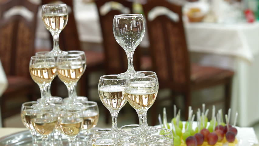The waiter serving champagne at the reception