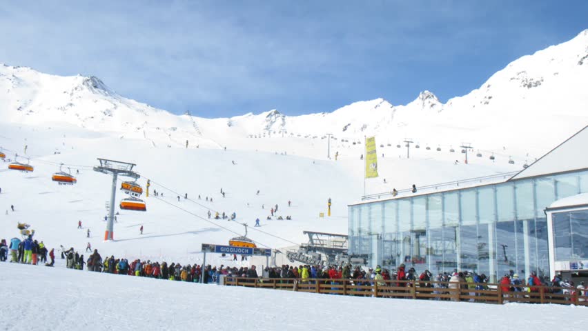 SOELDEN - FEB 12: (Timelapse View) People wait near station of rope-way of queue in zone of skiing of Giggijoch, on Feb 12, 2012 in Soelden, Austria
