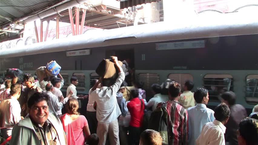 DELHI - NOV 13: People waiting for their trains in the Delhi Junction Railway Station on November 13, 2011 in Delhi, India. Delhi Junction is the oldest railway station of Delhi city.