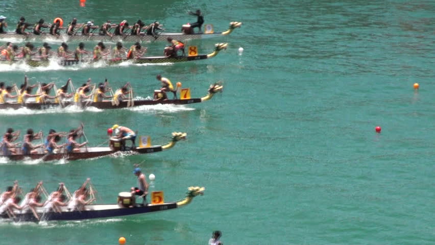 HONG KONG - 26 JULY: People take part in a dragon boat race July 26 2010 in Hong Kong