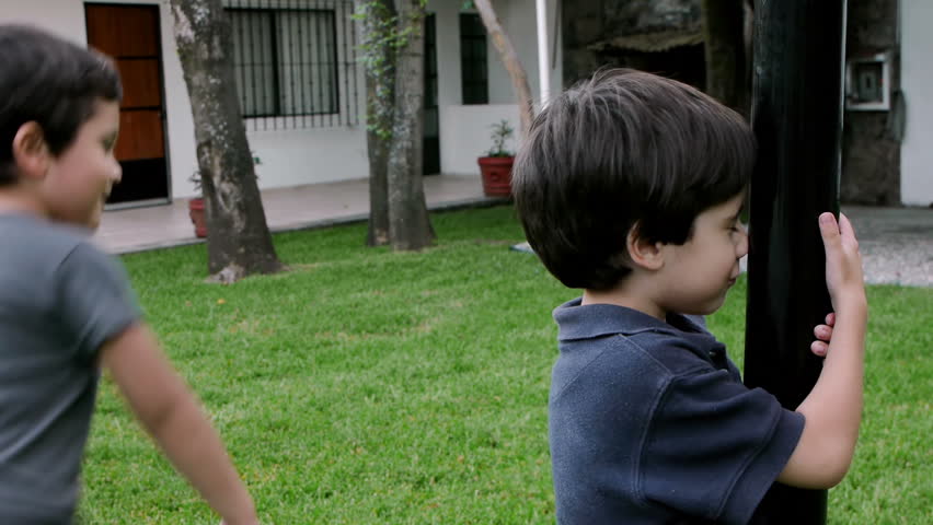 Brothers Playing Hide and Seek (HD). 6 and 4 years old playing hide and seek. Younger Brother counts.