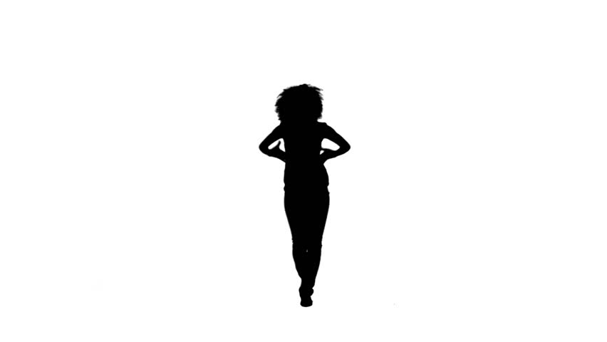 Silhouette of a energetic woman dancing against a white background
