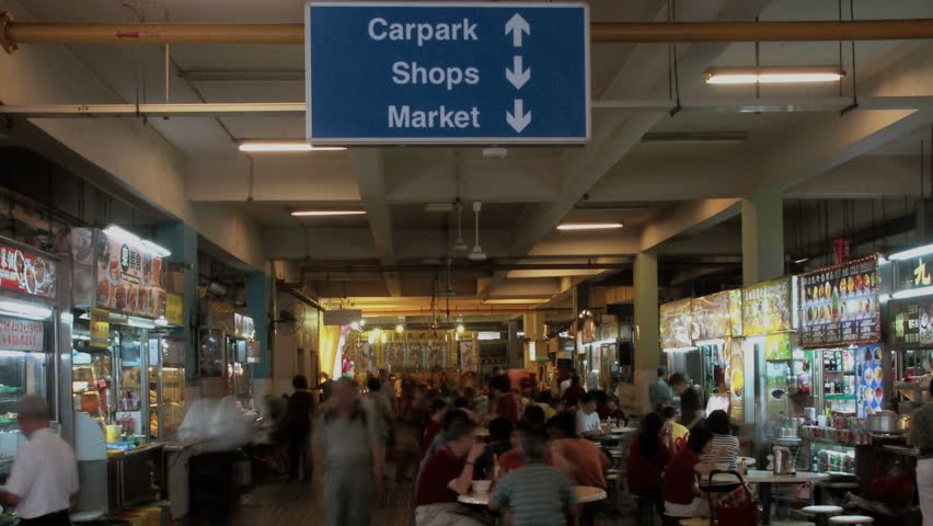 Singapore - Circa 2010: The Hawker Centre in 2010. Timelapse tilt down of hawker centre, Singapore, Asia.