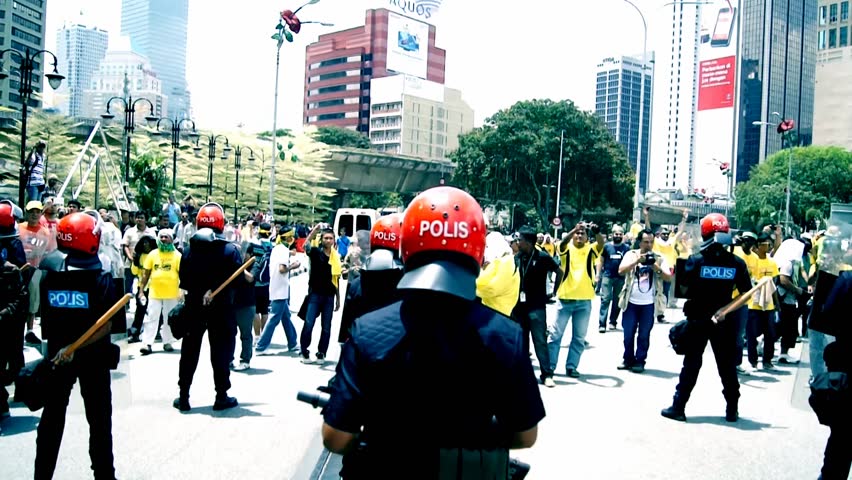 KUALA LUMPUR - APRIL 28, 2012: Protestors march during the Bersih 3.0 rally in Kuala Lumpur, Malaysia on April 28, 2012. The rally was organized by Coalition for Clean and Fair Elections to protest what they perceived as insincere election reforms.